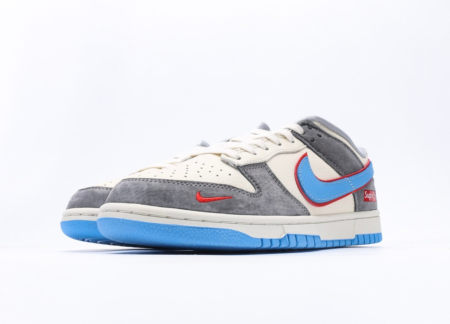 Nike Dunk Low x Supreme Blue Swoosh