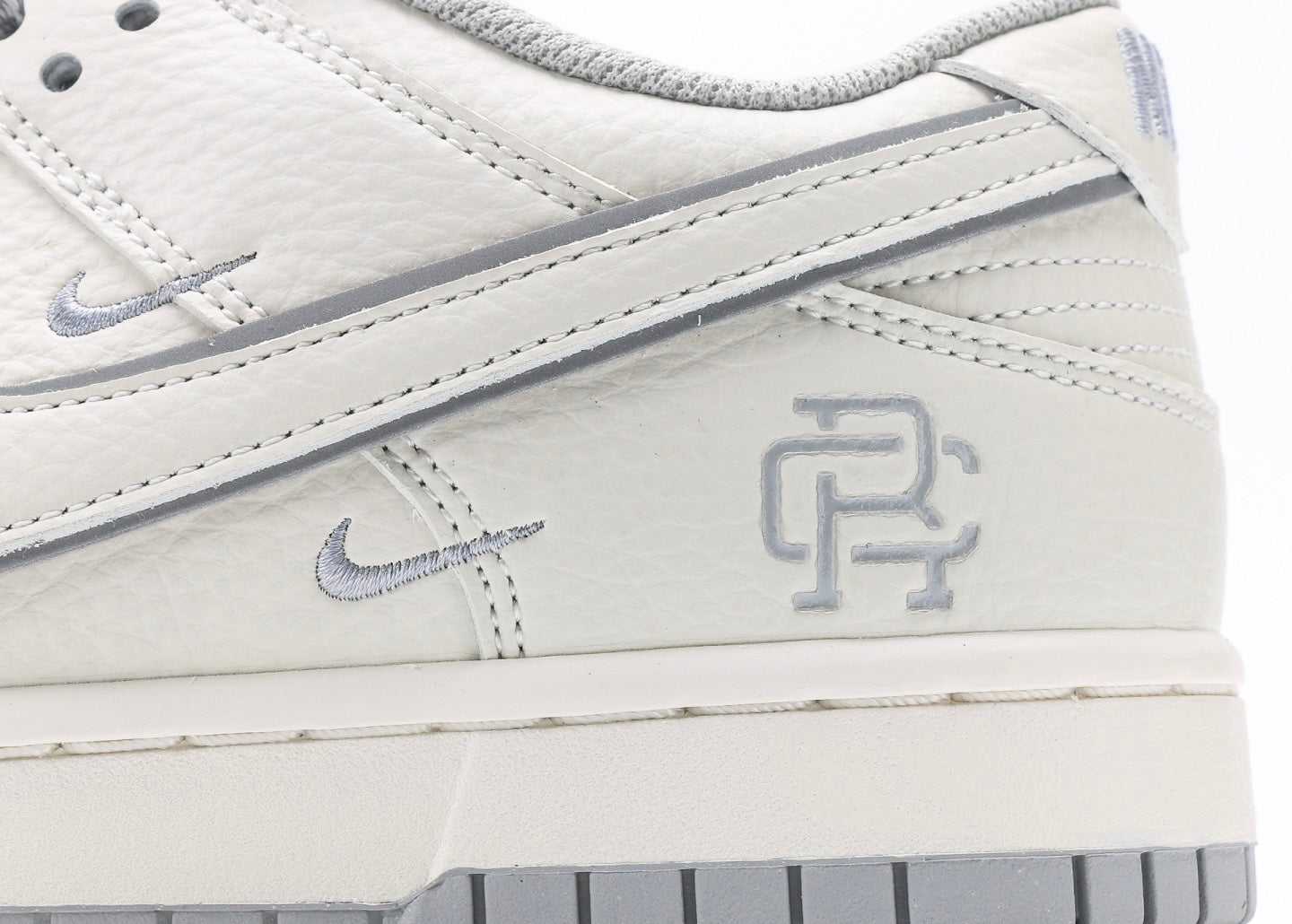 Nike Dunk Low x Reigning Champ